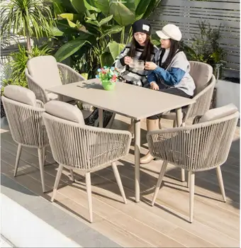 Açık masa ve sandalye kombinasyonu villa bahçe İskandinav teras masası halat dokuma yemek sandalyeleri